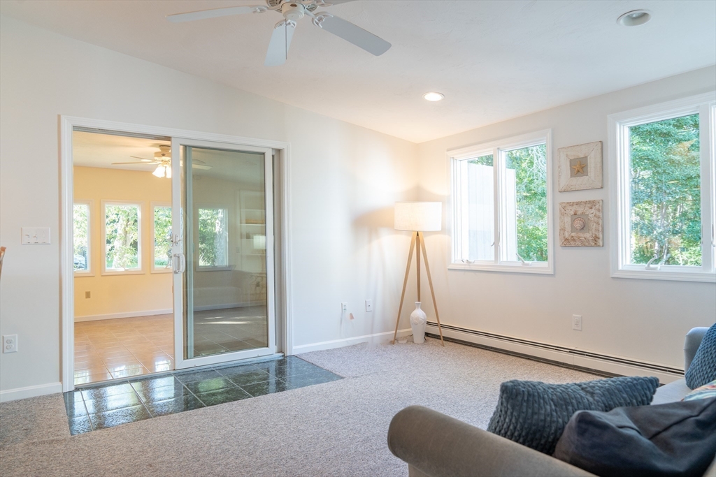 364 Lower County Road Harwich Port, MA 02646 - Photo 14 of 41 a living room with furniture and a large window