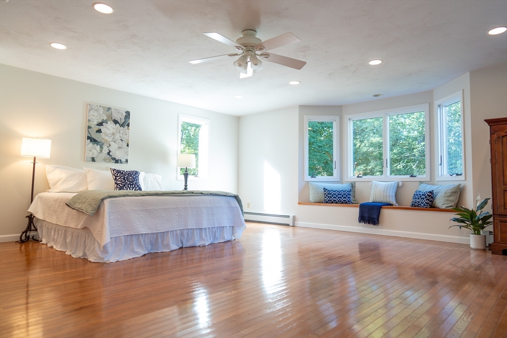 364 Lower County Road Harwich Port, MA 02646 - Photo 19 of 41 a living room with furniture and large windows