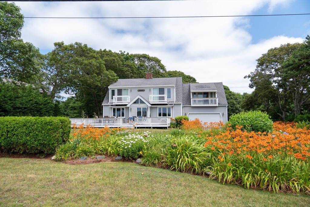 364 Lower County Road Harwich Port, MA 02646 - Photo 2 of 41 an aerial view of a house with a big yard