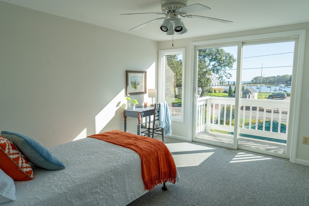 364 Lower County Road Harwich Port, MA 02646 - Photo 29 of 41 a bedroom with a bed and a large window