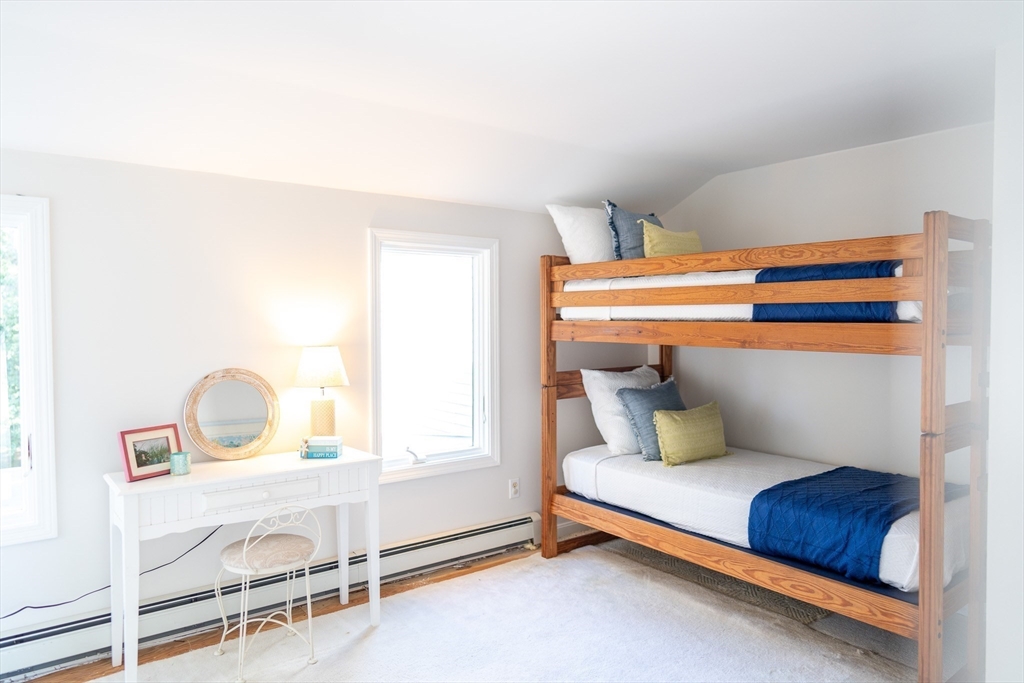 364 Lower County Road Harwich Port, MA 02646 - Photo 32 of 41 a bedroom with a bed and window