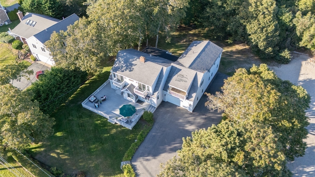 364 Lower County Road Harwich Port, MA 02646 - Photo 41 of 41 an aerial view of a house with garden space and street view