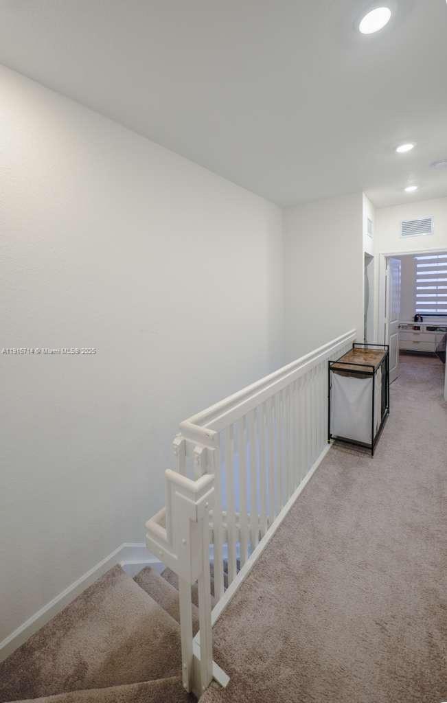 12869 Southwest 233rd Terrace Homestead, FL 33032 - Photo 17 of 30 a view of a livingroom with wooden floor and staircase