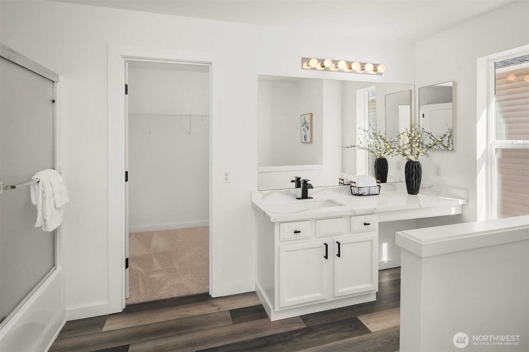 2529 Northeast 1st Street Renton, WA 98056 - Photo 8 of 10 a bathroom with a sink and a mirror