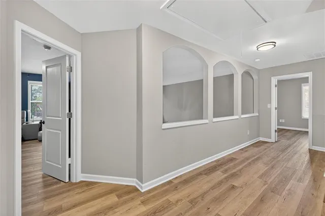 a bedroom with bed and a window