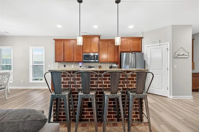 a view of a dining room with furniture