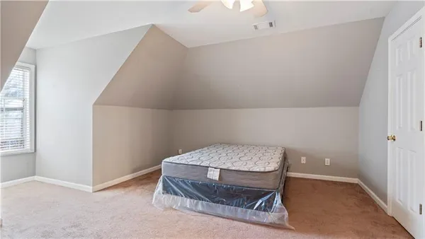a room with a table and chairs