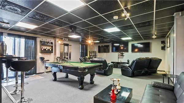 a living room with furniture and a table