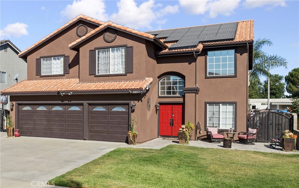 32853 Starlight Street Wildomar, CA 92595 - Photo 1 of 32 a front view of a house with a yard