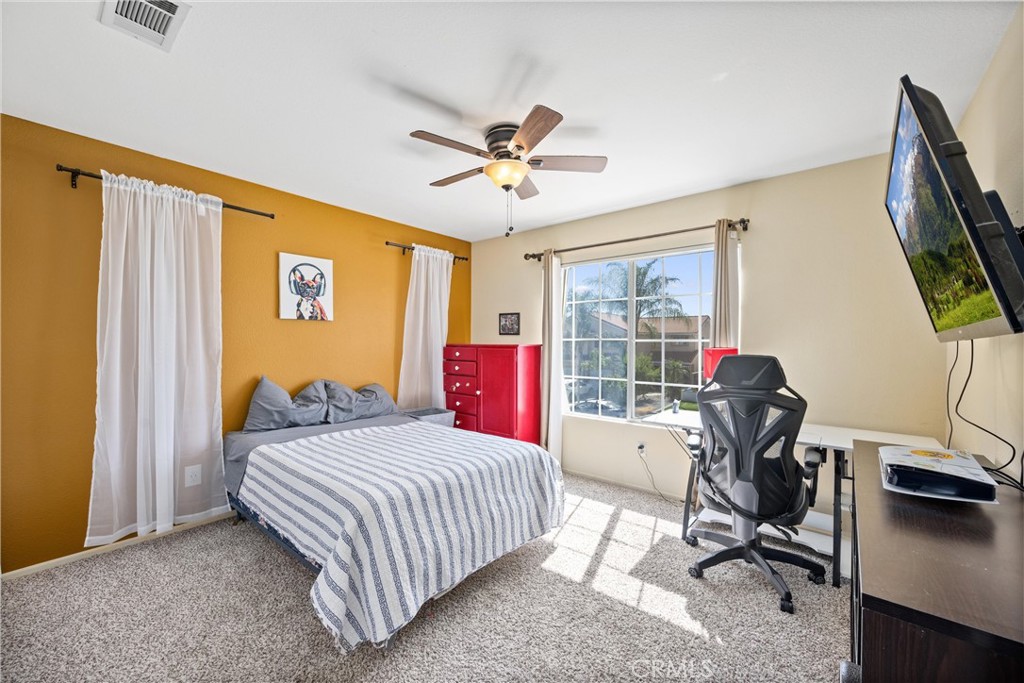 32853 Starlight Street Wildomar, CA 92595 - Photo 20 of 32 a bedroom with furniture and a window