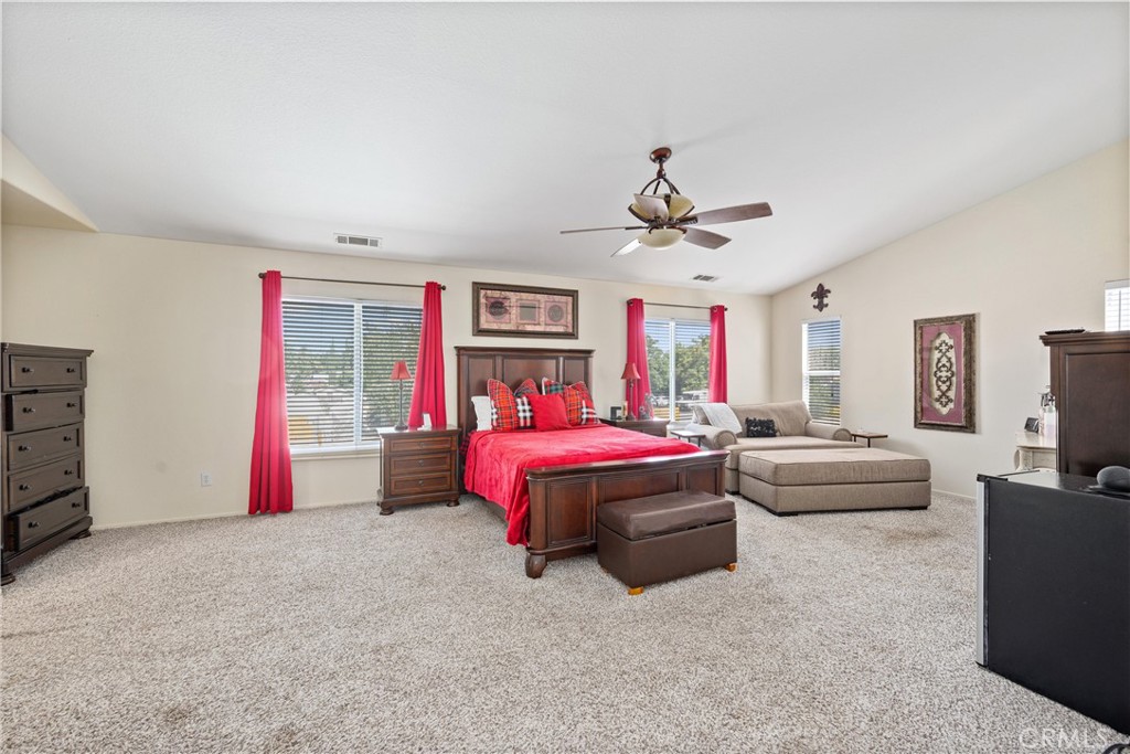 32853 Starlight Street Wildomar, CA 92595 - Photo 23 of 32 a living room with furniture and a flat screen tv