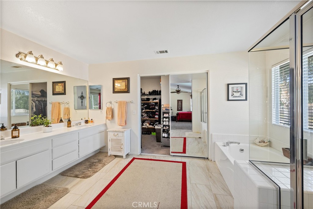 32853 Starlight Street Wildomar, CA 92595 - Photo 25 of 32 a large white room with mirror and view