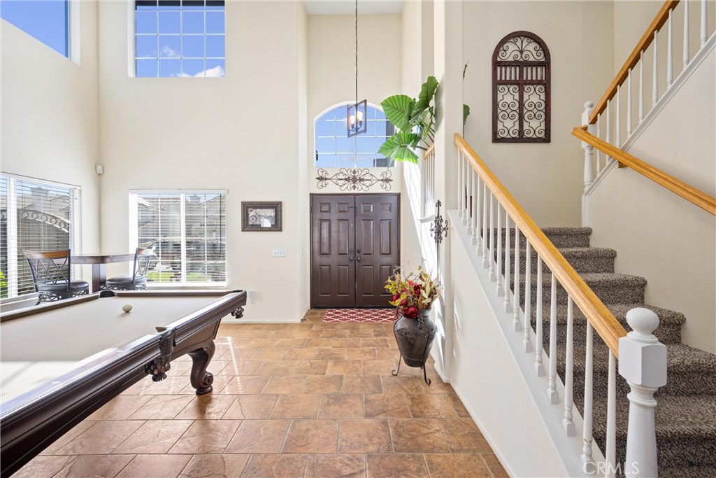32853 Starlight Street Wildomar, CA 92595 - Photo 3 of 32 a dining room with furniture and a potted plant