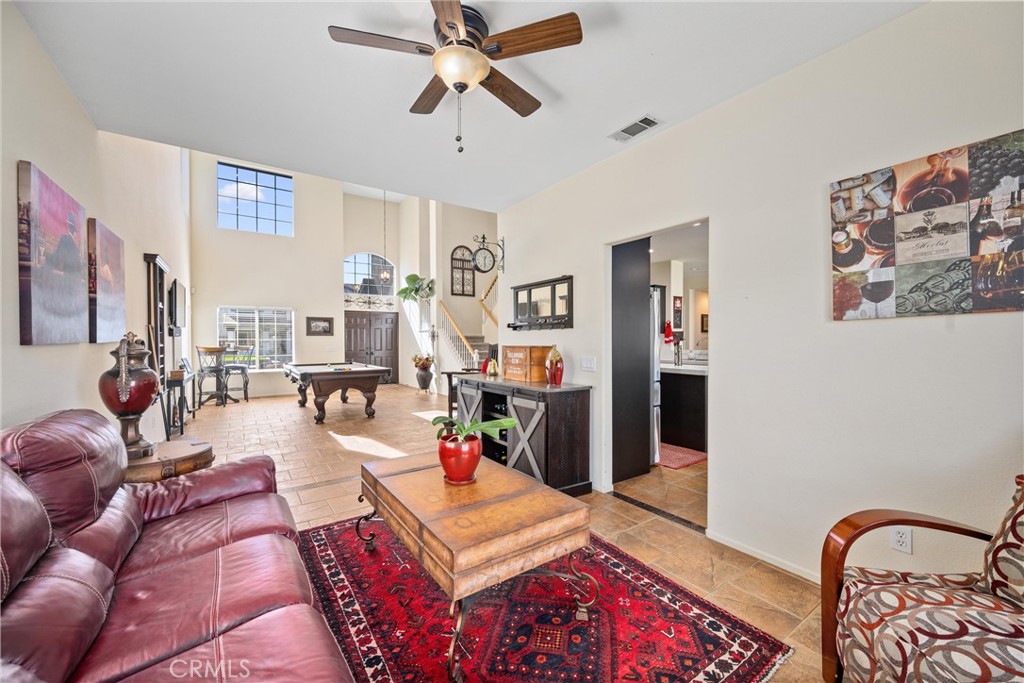 32853 Starlight Street Wildomar, CA 92595 - Photo 8 of 32 a living room with furniture and flat screen tv