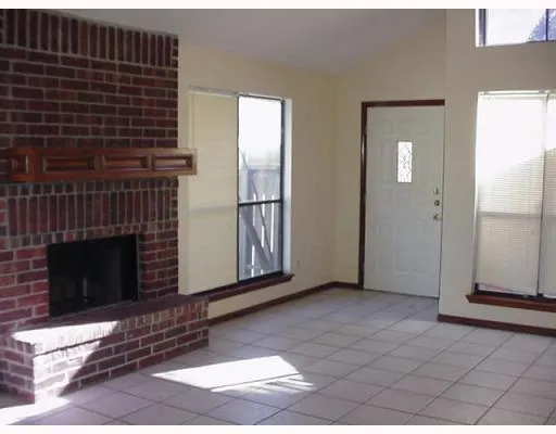 a view of a livingroom with a fireplace
