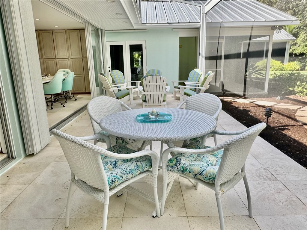 315 Greytwig Road Vero Beach, FL 32963 - Photo 13 of 36 a dining room with furniture and window