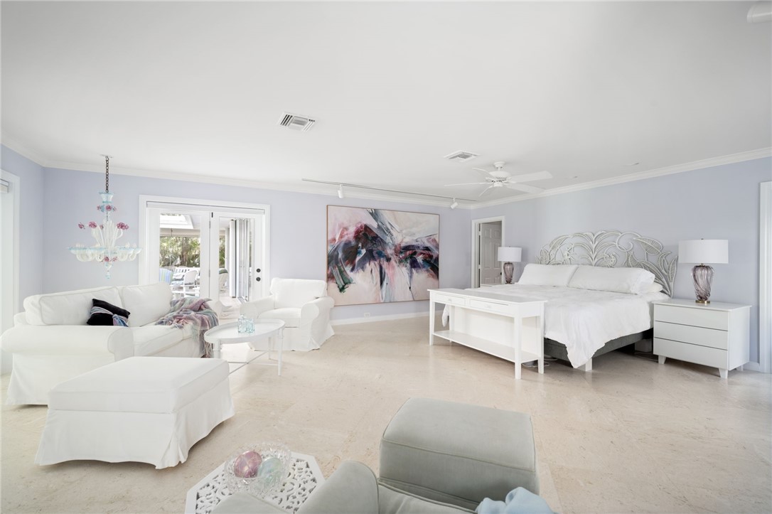 315 Greytwig Road Vero Beach, FL 32963 - Photo 15 of 36 a living room with furniture and a large window