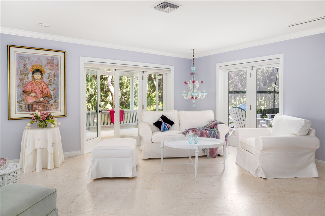 315 Greytwig Road Vero Beach, FL 32963 - Photo 17 of 36 a living room with furniture and a large window