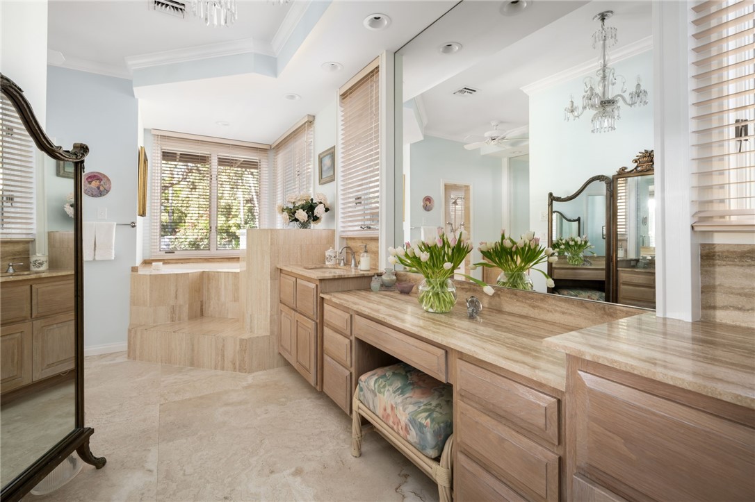 315 Greytwig Road Vero Beach, FL 32963 - Photo 18 of 36 a kitchen with stainless steel appliances granite countertop a refrigerator a sink and a stove