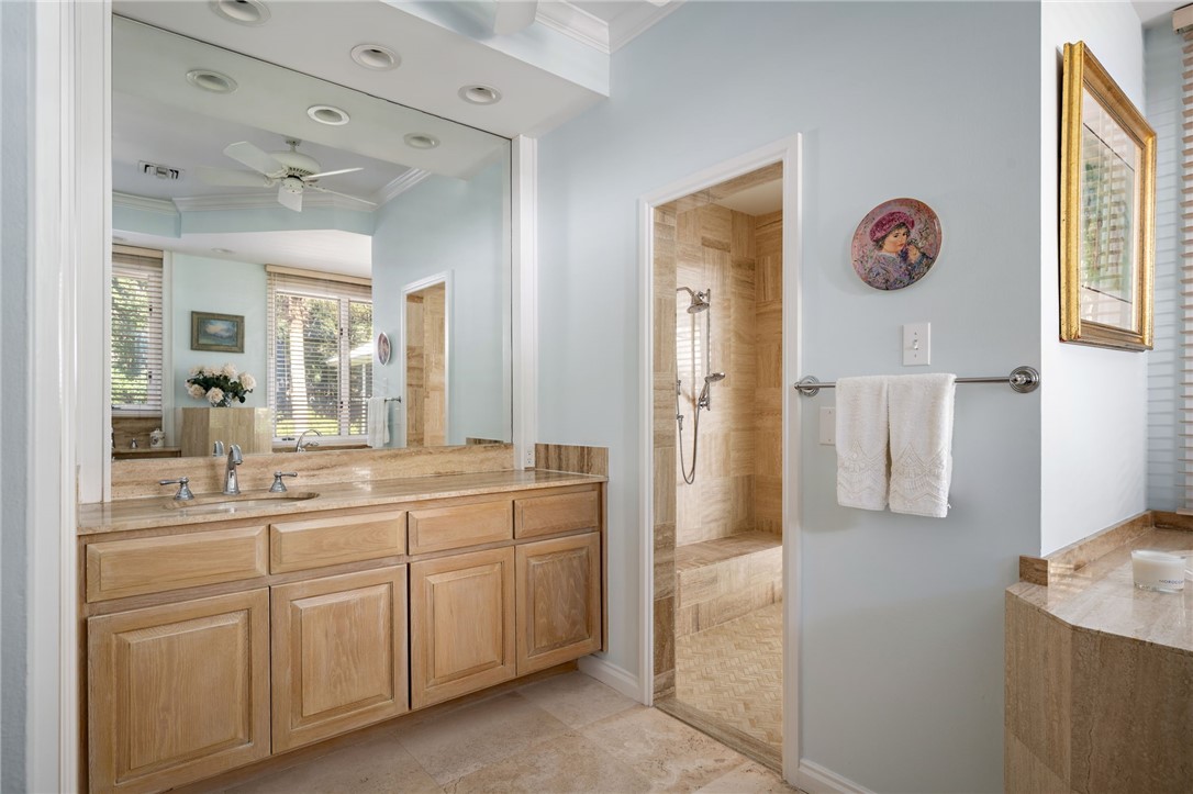315 Greytwig Road Vero Beach, FL 32963 - Photo 19 of 36 a spacious bathroom with a double vanity sink and a mirror