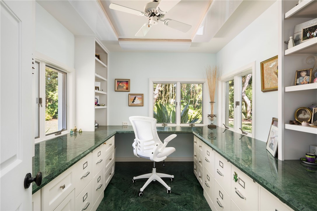 315 Greytwig Road Vero Beach, FL 32963 - Photo 21 of 36 a living room with furniture and a large window