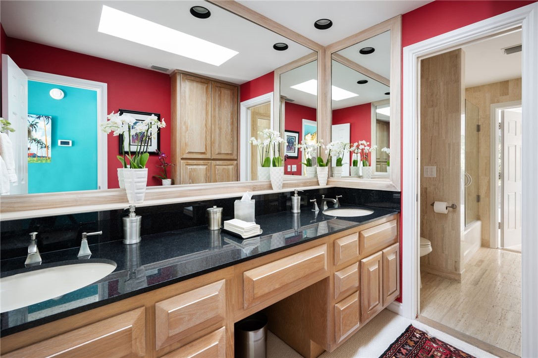 315 Greytwig Road Vero Beach, FL 32963 - Photo 22 of 36 a kitchen with stainless steel appliances double vanity and a window