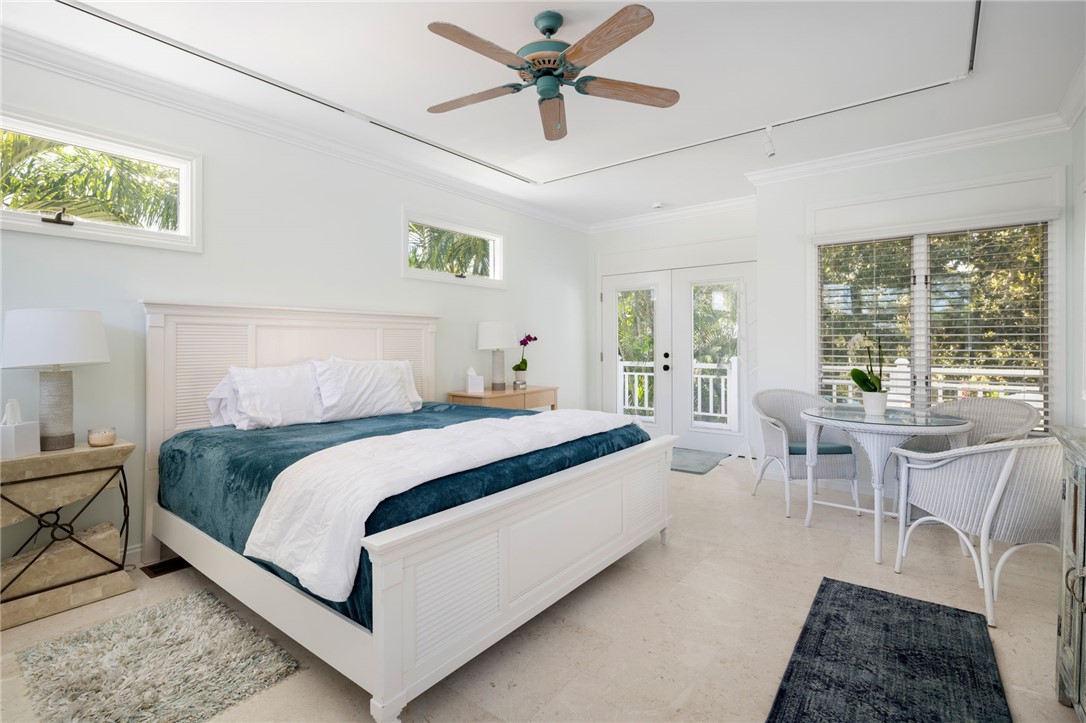 315 Greytwig Road Vero Beach, FL 32963 - Photo 25 of 36 a bed room with a bed and a chair