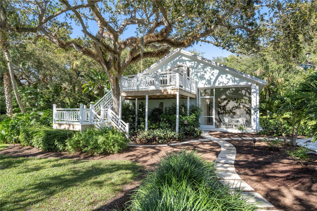 315 Greytwig Road Vero Beach, FL 32963 - Photo 26 of 36 a view of a house with yard and sitting area