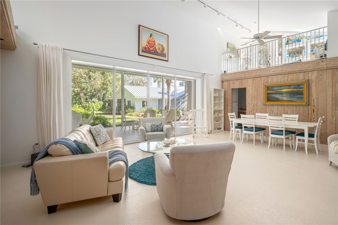 315 Greytwig Road Vero Beach, FL 32963 - Photo 29 of 36 a living room with furniture and a large window