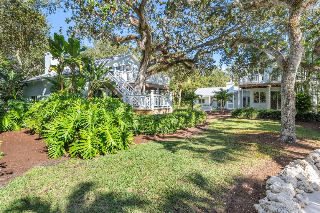 315 Greytwig Road Vero Beach, FL 32963 - Photo 36 of 36 a view of a house with a big yard and large trees