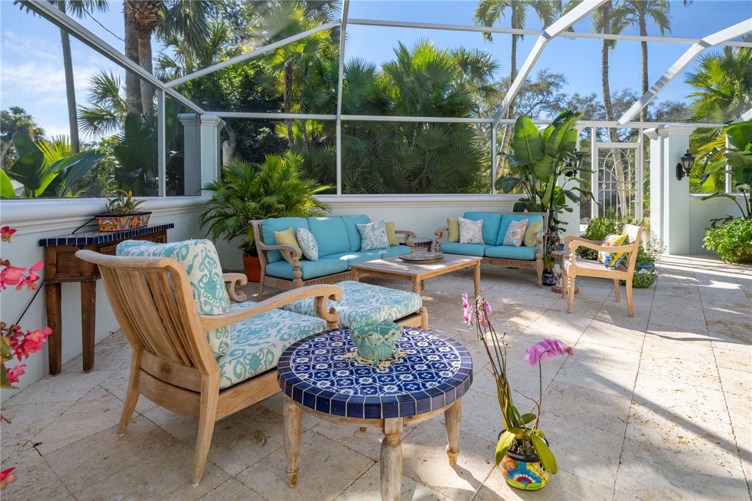 315 Greytwig Road Vero Beach, FL 32963 - Photo 7 of 36 a view of a chairs and table in the patio