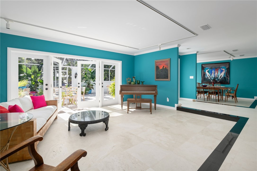 315 Greytwig Road Vero Beach, FL 32963 - Photo 8 of 36 a living room with furniture and a large window