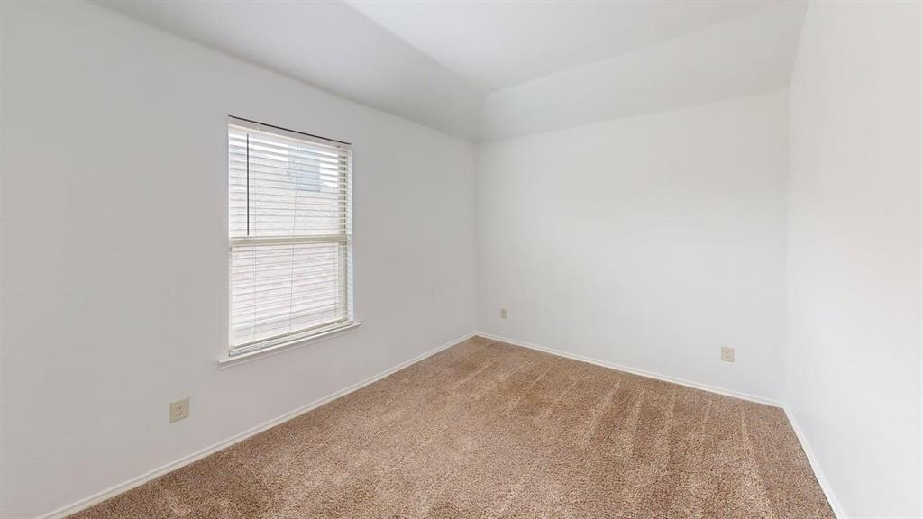 101 Rocky Pine Road McKinney, TX 75072 - Photo 22 of 39 an empty room with windows