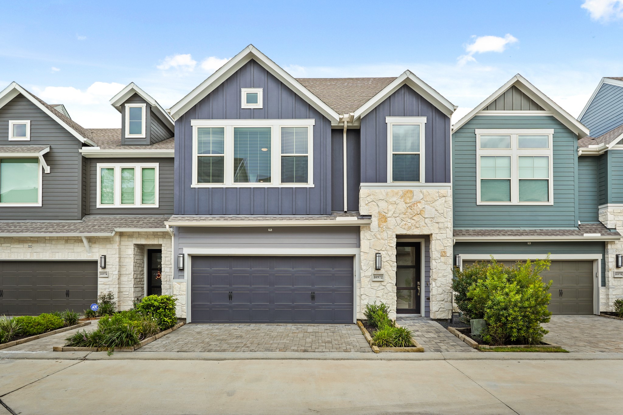 10972 Hewitt Cliff Lane Houston, TX 77043 - Photo 1 of 23 front view of a house with a yard