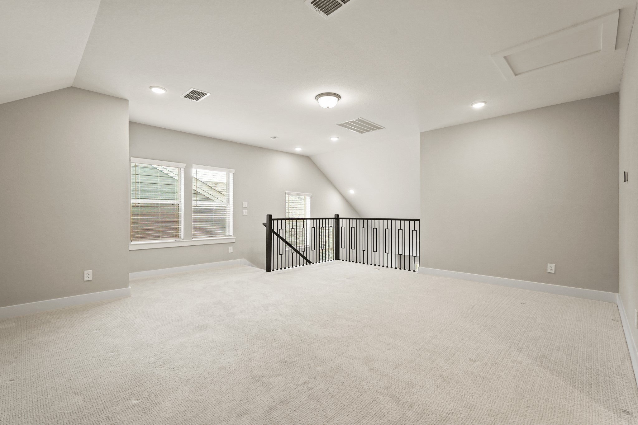 10972 Hewitt Cliff Lane Houston, TX 77043 - Photo 19 of 23 a view of an empty room with a window
