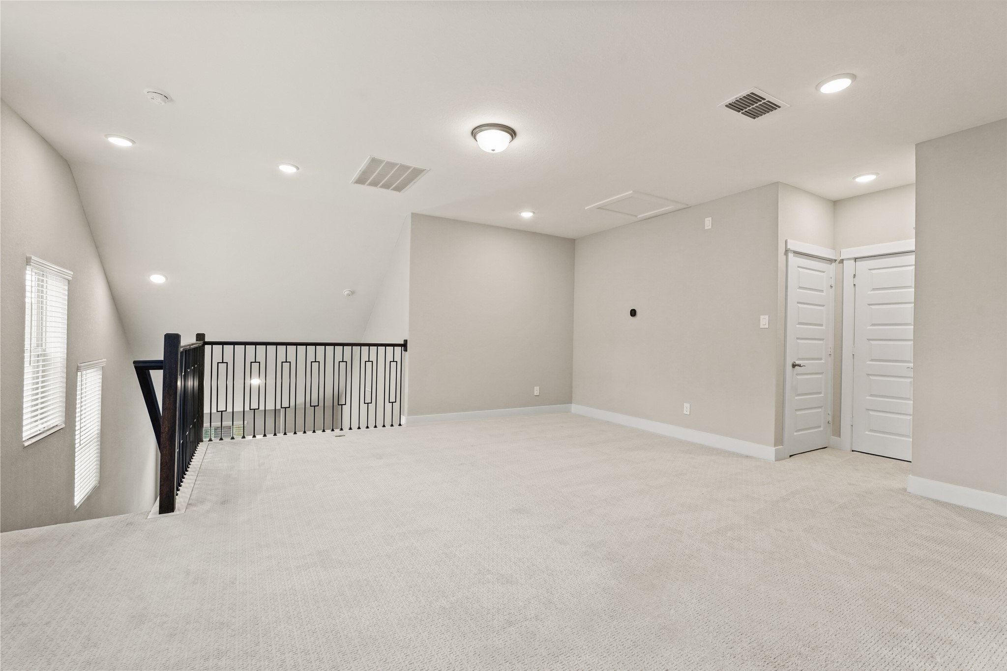 10972 Hewitt Cliff Lane Houston, TX 77043 - Photo 20 of 23 a view of an empty room