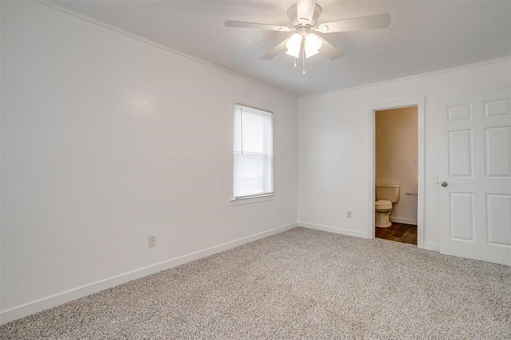 3105 Acton School Road Granbury, TX 76049 - Photo 28 of 40 wooden floor in an empty room with a window