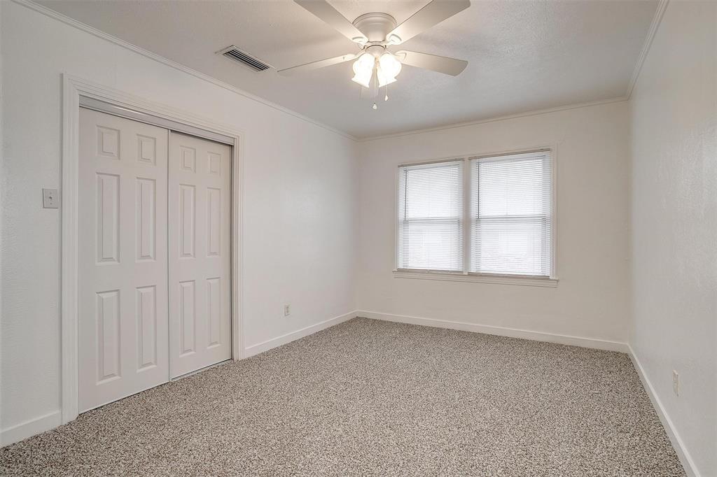 3105 Acton School Road Granbury, TX 76049 - Photo 31 of 40 an empty room with windows and fan