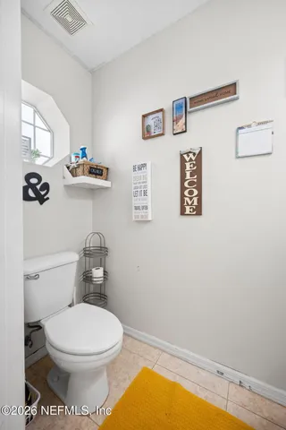 a bathroom with a toilet and a sink