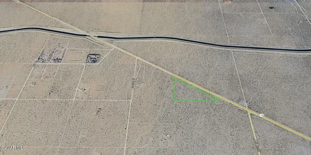 a view of staircase with white walls