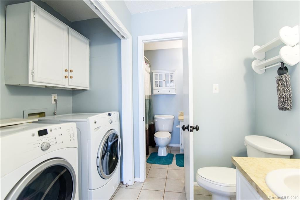 4043 Windward Drive Tega Cay, SC 29708 - Photo 17 of 25 a view of bathroom with a washer and dryer