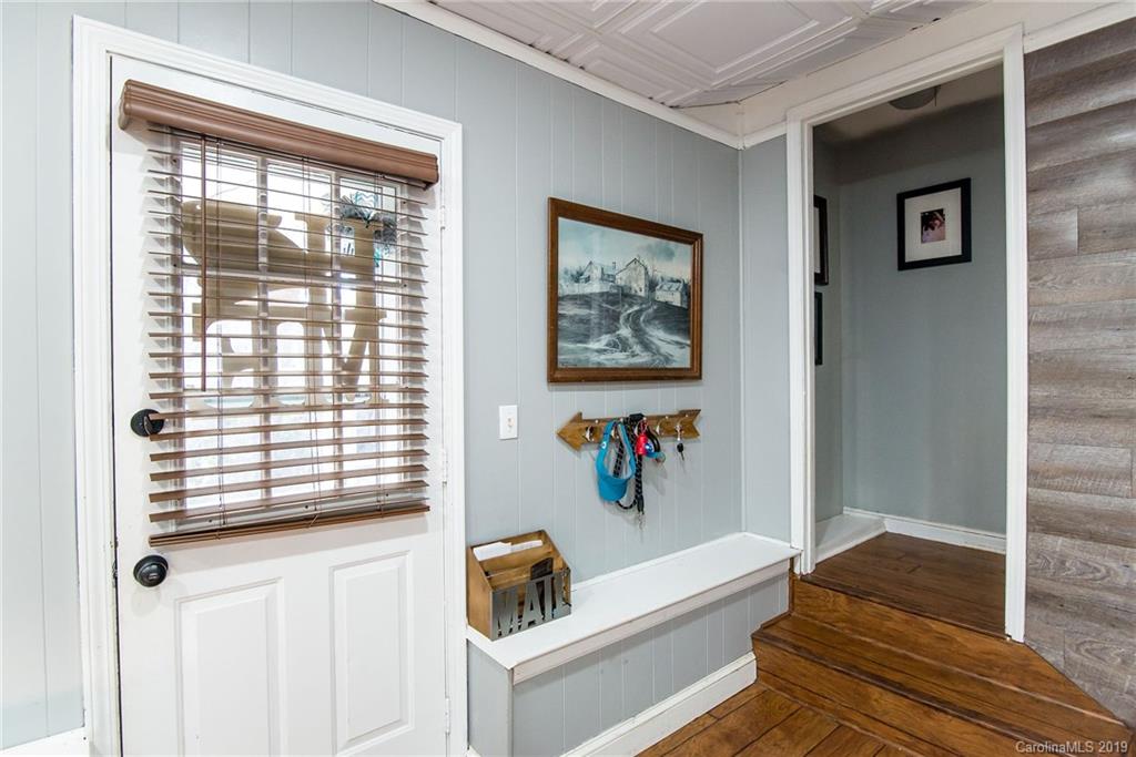 4043 Windward Drive Tega Cay, SC 29708 - Photo 5 of 25 a bathroom with a bathtub and a window