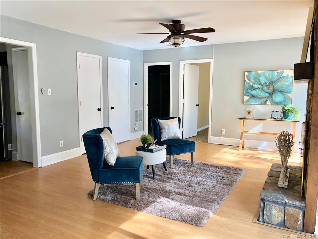 4043 Windward Drive Tega Cay, SC 29708 - Photo 6 of 25 a living room with furniture and a couch