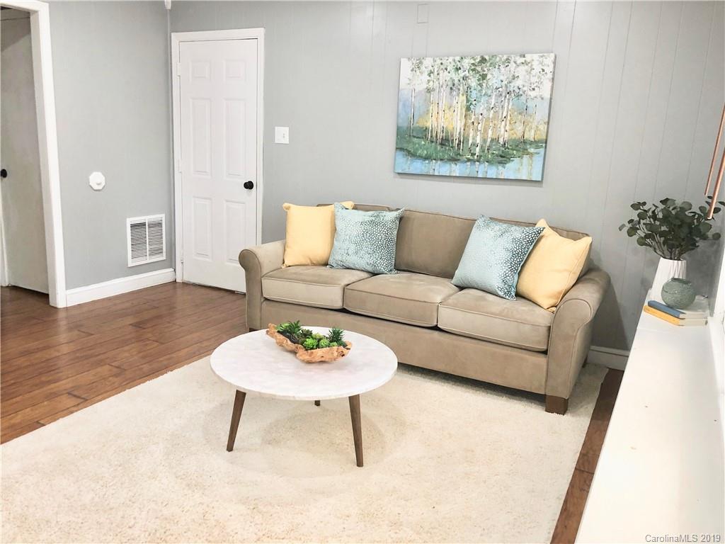 4043 Windward Drive Tega Cay, SC 29708 - Photo 8 of 25 a living room with furniture and a wooden floor