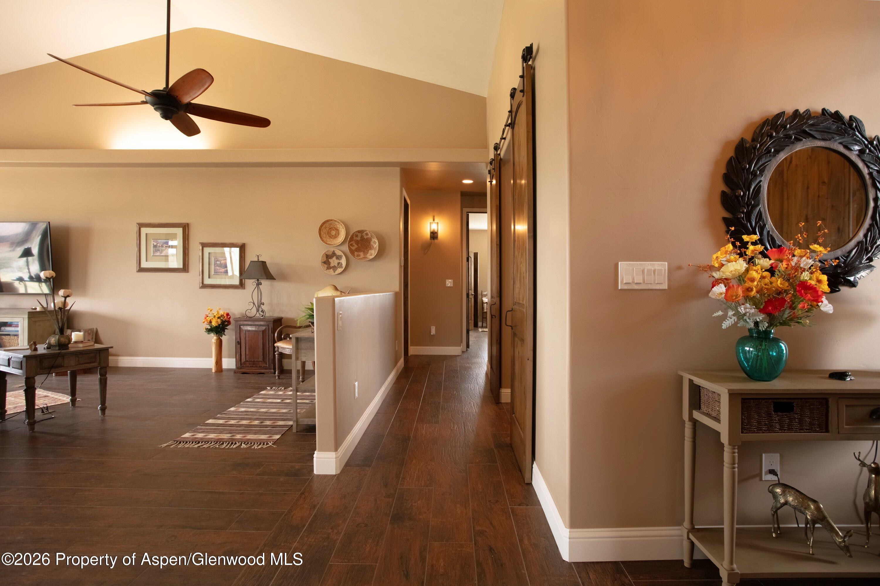 265 South Meadow Drive Rifle, CO 81650 - Photo 30 of 76 a view of a livingroom with furniture and a ceiling fan