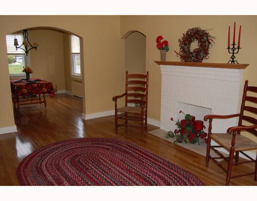 14 Braddock Rd Avenue Mount Pleasant, PA 15666 - Photo 4 of 10 Living Room. Hardwood flooring continues throughout adjacent dining room, entrance & hallway. Archways, plaster walls, plaster textured ceilings, and moldings enhance the quality of this home.