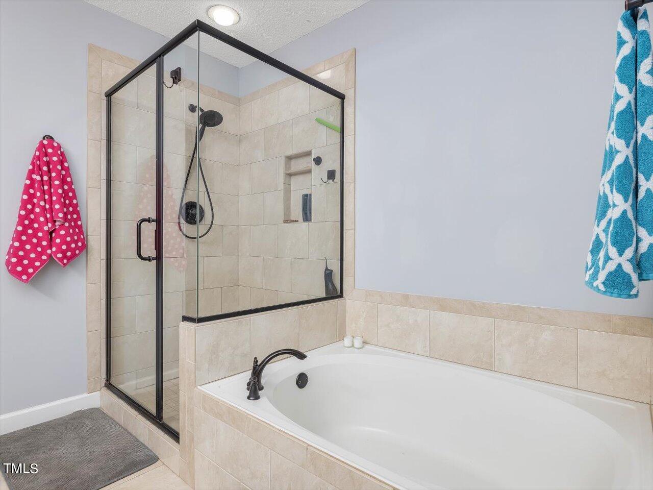 8200 Greywinds Drive Raleigh, NC 27615 - Photo 24 of 39 35-Primary Bathroom