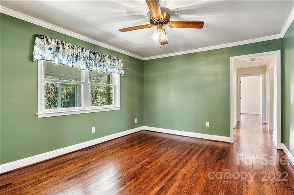 422 Fieldstone Road Mooresville, NC 28115 - Photo 14 of 36 wooden floor in an empty room with a window
