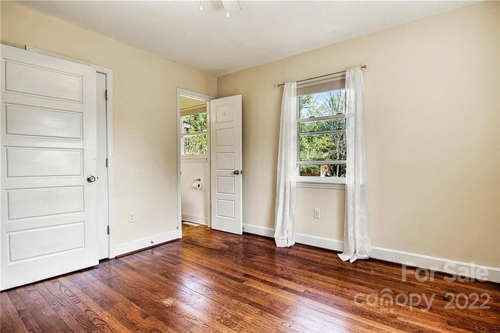 422 Fieldstone Road Mooresville, NC 28115 - Photo 21 of 36 wooden floor in an empty room with a window