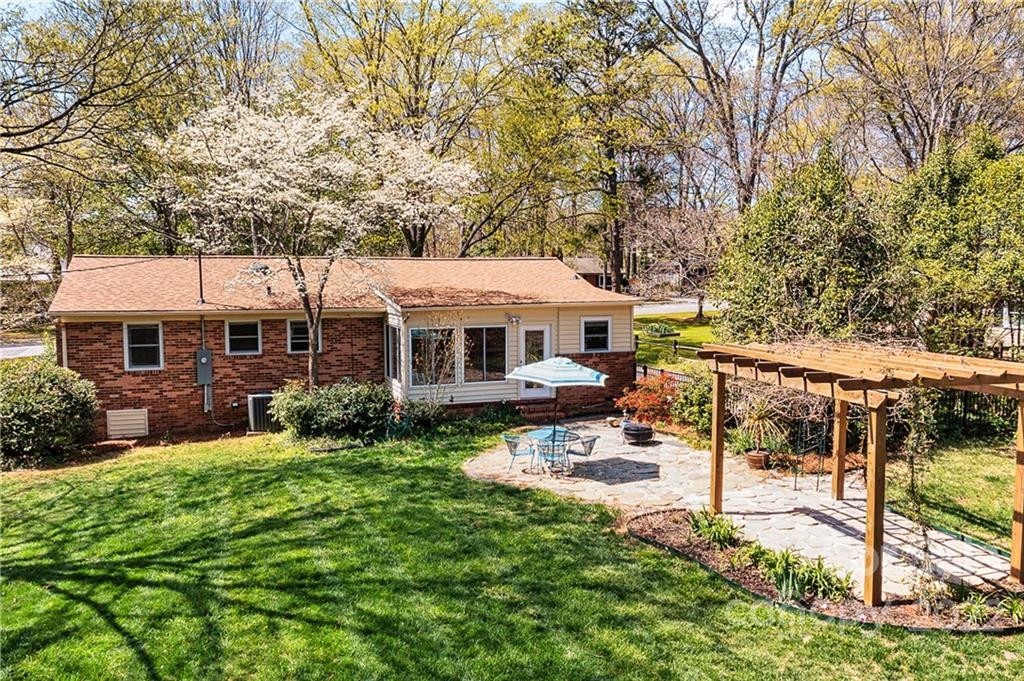 422 Fieldstone Road Mooresville, NC 28115 - Photo 30 of 36 a view of a house with backyard and sitting area